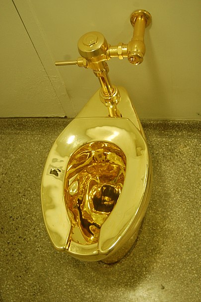 America by Cattelan: a gold toilet